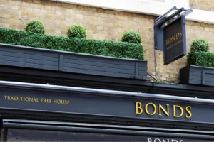 BONDS lettering above a dark shopfront