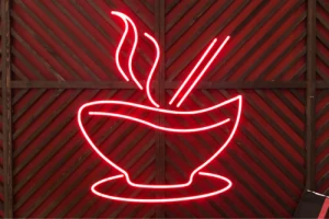 Red illuminated steaming cup symbol